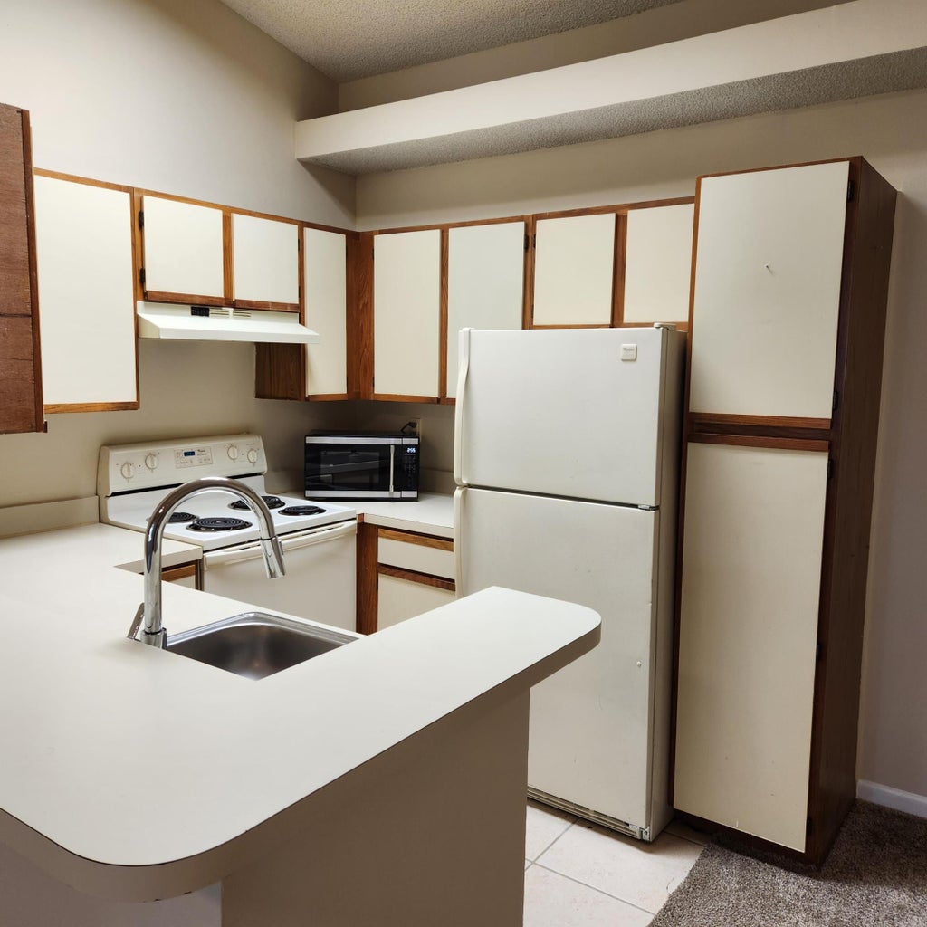 Photo of 851 Lyons Road #22203, Coconut Creek, FL 33063 (MLS # B26071124)