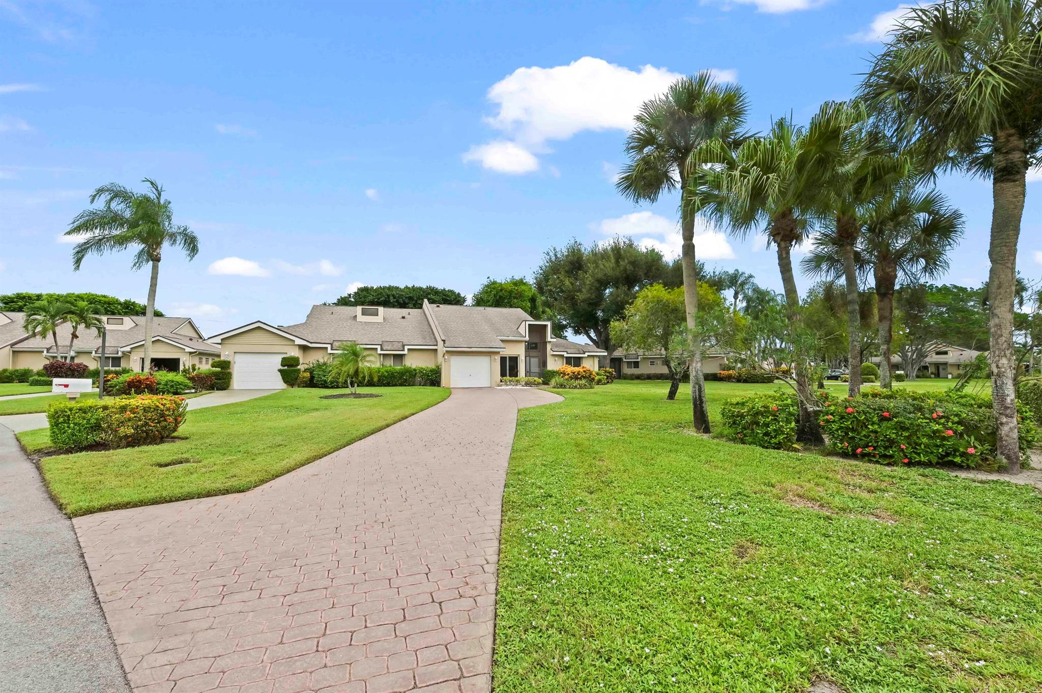 Prepare to be impressed by this open and spacious, well-maintained villa, offering over 2,000 square feet of comfortable living space. The moment you step inside, you'll be greeted by soaring volume ceilings that create an immediate sense of grandeur, making the home feel even bigger and brighter. The heart of the residence is its beautifully updated kitchen--a true standout that is both modern and highly functional, ready to inspire your culinary adventures. The master bedroom serves as a cozy retreat, complete with its own private ensuite bathroom and a large, custom walk-in closet designed for optimal organization.