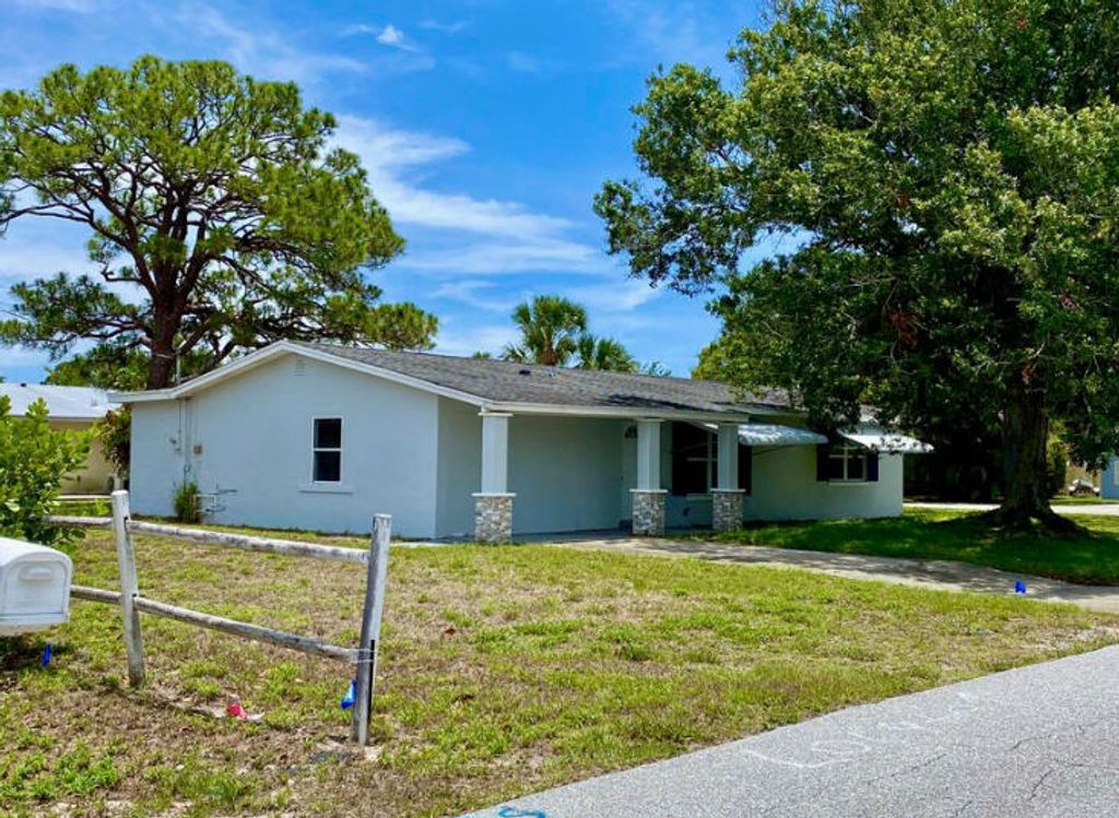 Photo of 3177 NE Lake Place, Jensen Beach, FL 34957 (MLS # R10790851)
