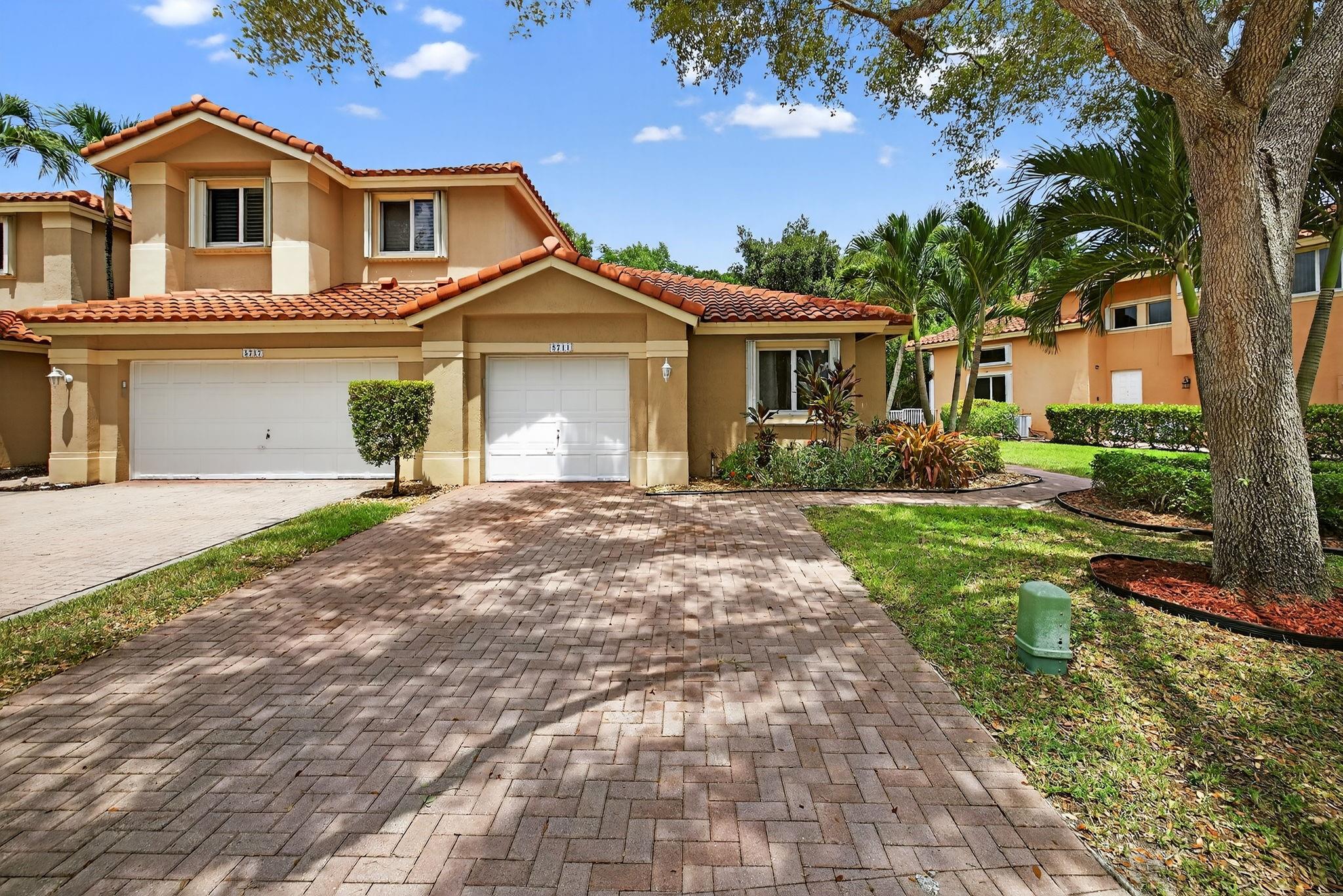 Immaculate 3BR/2BA corner unit in the Fairways of Heron Bay, offering style, space, and resort-style living. Enjoy a light-filled open layout with renovated baths, freshly painted interiors, and a new roof. Designed for comfort with custom built-ins, generous storage, a private patio, and an attached 1-car garage. Located in a gated community with A+ rated schools and unmatched amenities: 2 clubhouses, 12 tennis courts, basketball, racquetball, fitness center, and game room. A rare rental in a coveted neighborhood!