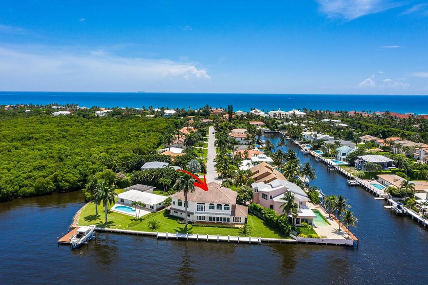 Beautiful direct Intracoastal estate & dock on cul-de-sac point lot with 165 feet on the ICW. 24,000 lb lift can accommodate up to 38' boat. Dramatic two story living area with an open floor plan centered around a chefs kitchen. Upstairs there is an oversized master suite and sitting area/office. 2 huge walk-in closets and a master bath with a magnificent shower and tub over looking the Intracoastal. Just a short walk to the beach and minutes by boat to the Boynton Beach Inlet. There is fine dining across the Woolbright Bridge and only 4 miles to downtown Delray Beach and 20 minutes to Worth Avenue, both areas offering world class shopping, nightlife and dining.