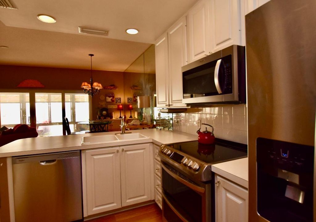 Photo of 67 Tall Oaks Circle, Tequesta, FL 33469 (MLS # R11074822)