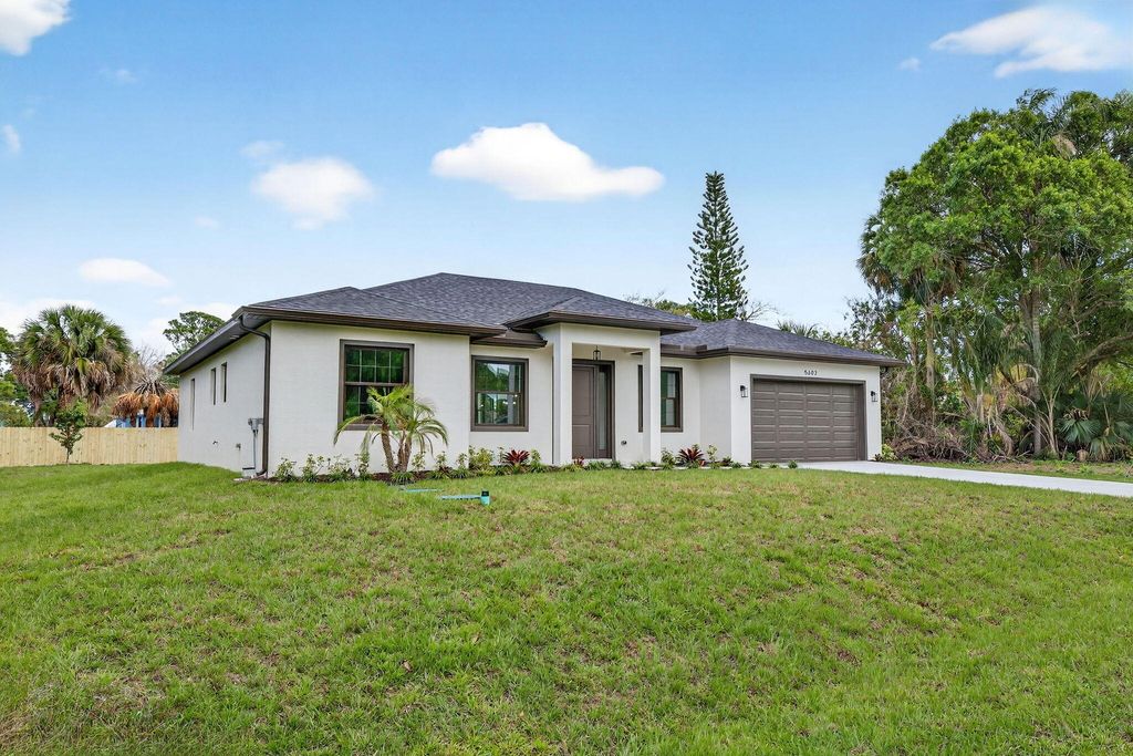 Photo of 5602 Tangelo Drive, Fort Pierce, FL 34982 (MLS # R11144297)