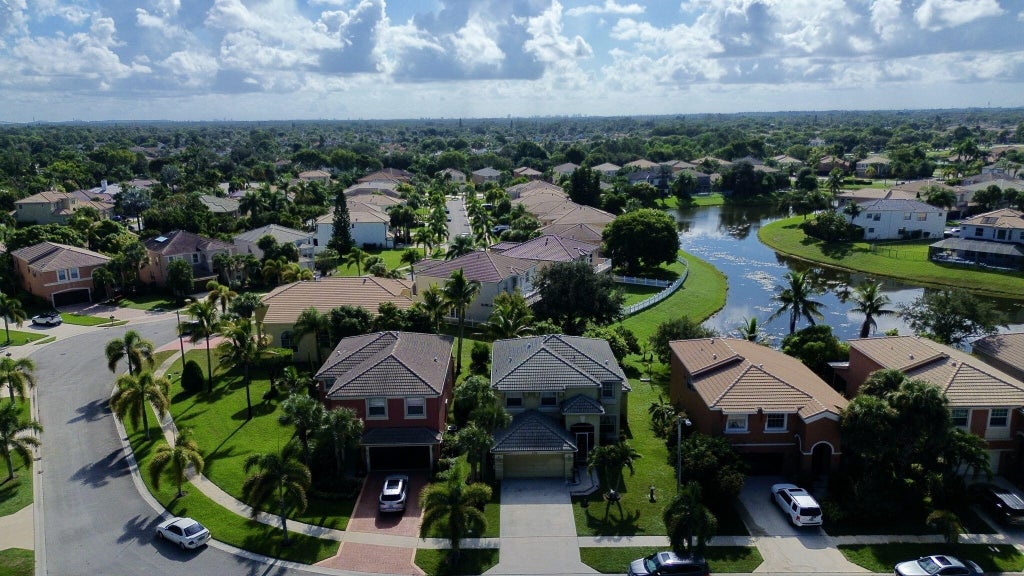 Photo of 2745 Misty Oaks Circle, Royal Palm Beach, FL 33411 (MLS # B26064304)