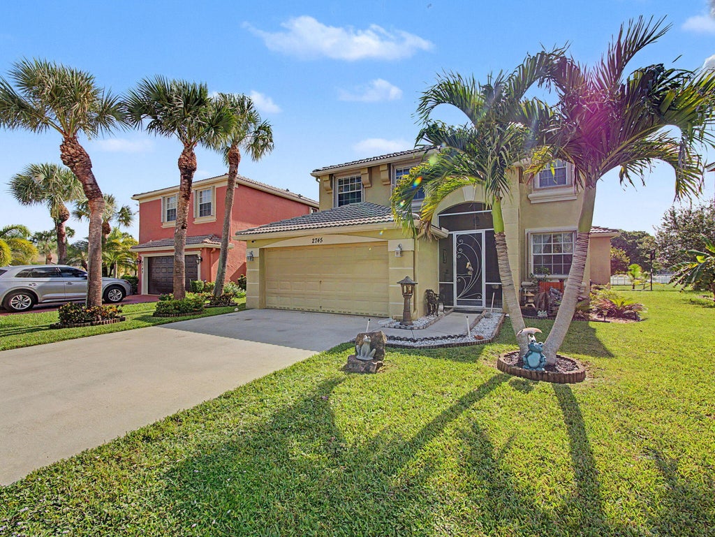 Photo of 2745 Misty Oaks Circle, Royal Palm Beach, FL 33411 (MLS # B26064304)