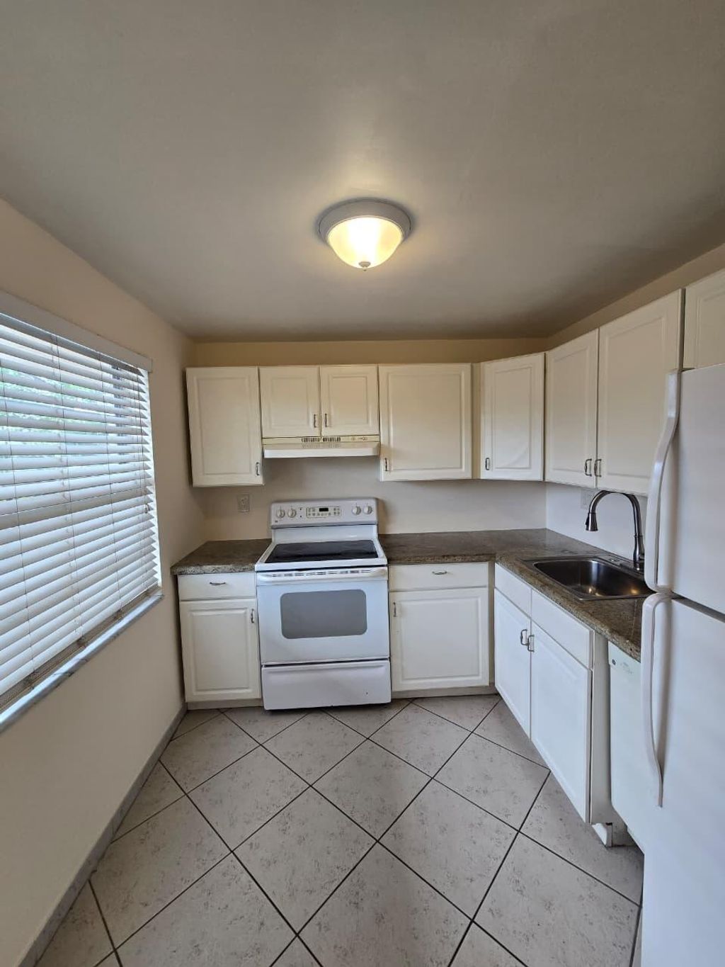 Photo of 3141 NW 47th Terrace #326, Lauderdale Lakes, FL 33319 (MLS # B26029089)