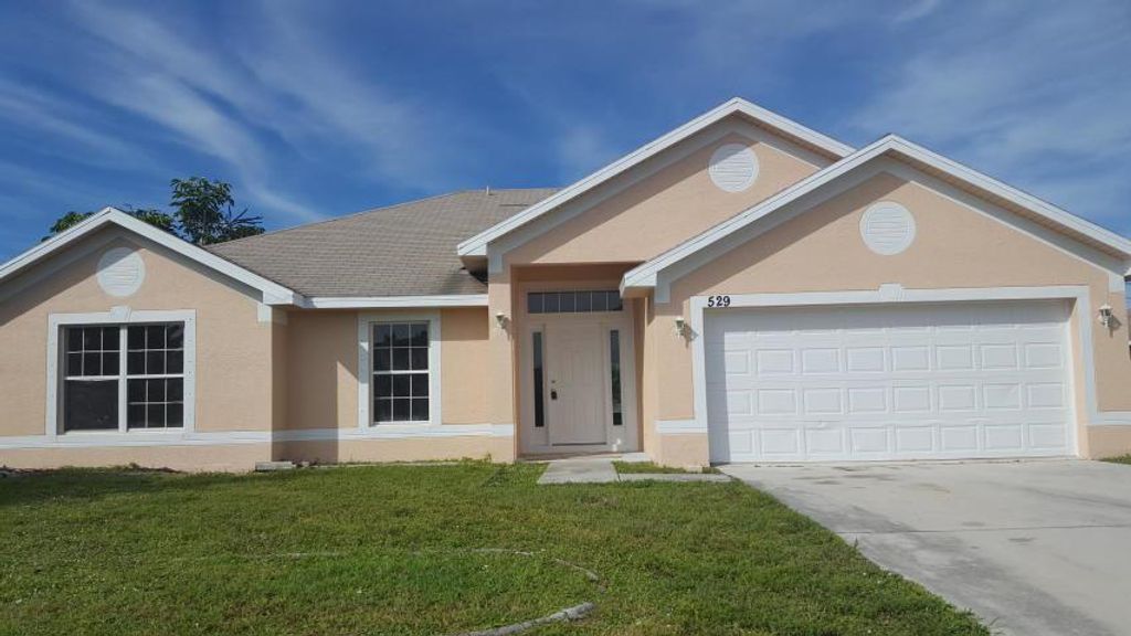 Photo of 529 SW Baoy Avenue Ave SW, Port St Lucie, FL 34953 (MLS # R10751606)