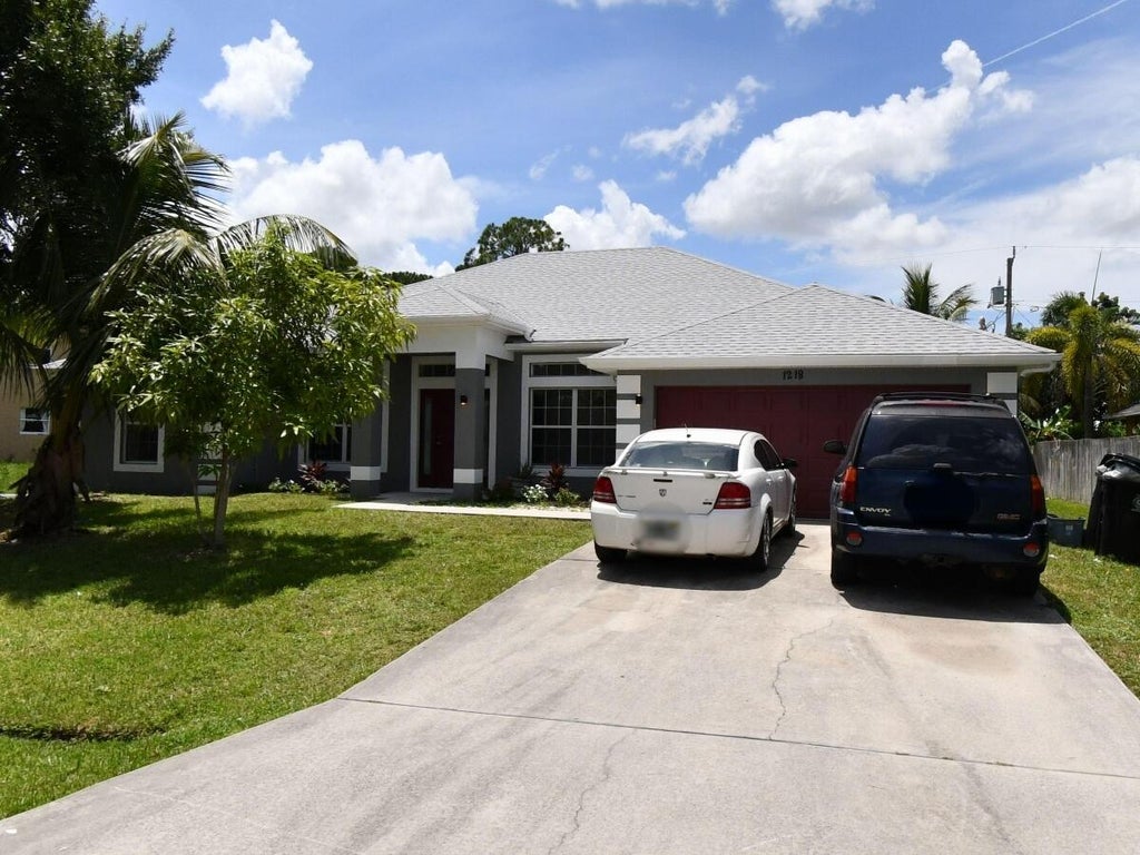 Photo of 1218 SW Melrose Avenue, Port Saint Lucie, FL 34953 (MLS # B26073847)