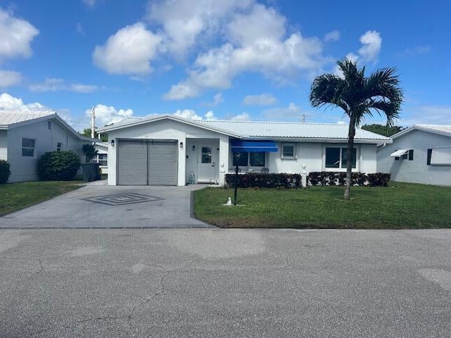 Photo of 913 SW 3RD Avenue, Boynton Beach, FL 33426 (MLS # B26094821)