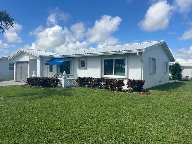 Photo of 913 SW 3RD Avenue, Boynton Beach, FL 33426 (MLS # B26094821)