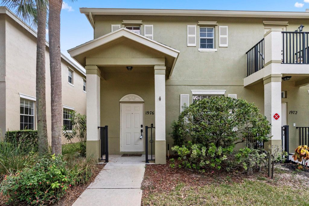 Photo of 1976 SE High Springs Drive, Port Saint Lucie, FL 34952 (MLS # R10995562)