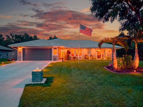 Photo of 755 SW Tupper Lane, Port Saint Lucie, FL 34953 (MLS # B26089927)