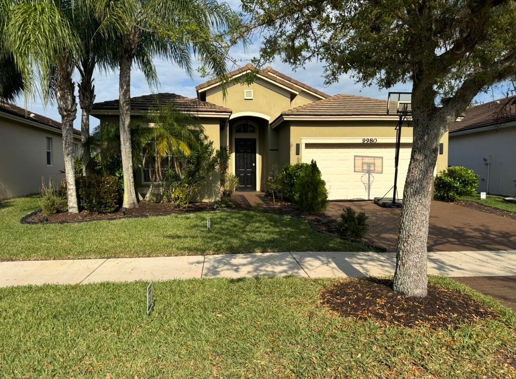 Photo of 9980 SW Stonegate Drive, Port Saint Lucie, FL 34987 (MLS # B26029908)