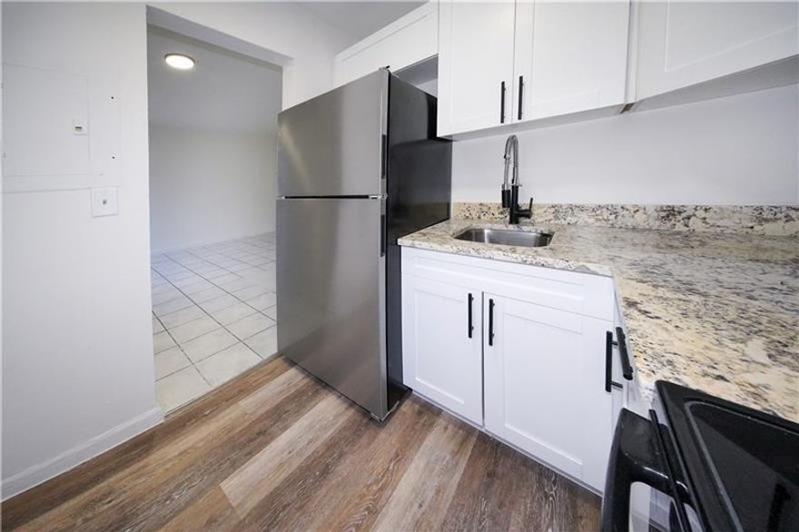 Remodeled 1 bedroom in Miami. New appliances, remodeled bathroom, central AC, hurricane impact windows, gated community.