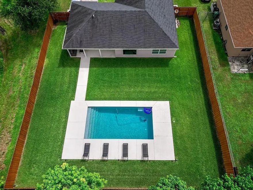 Walton Rd Stunner! 3 Bed/ 2 Bath/ 1 Car Garage Corner Lot Pool Home! Home Features: Brand New Pool, New Impact Windows in the Front, Newer Roof, Eat in Kitchen with Sliders to Covered Patio, Large Living Room & More. Location, Location, Location: Close to Port St Lucie Civic Center, Cross Town for Commuting, Jensen Beach, Shopping, Dinning, Hospital, Mall. Area Has Underground Utilities. This is Truly a Must See!