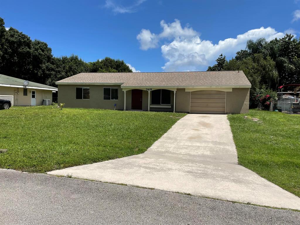 Photo of 349 SW Cherryhill Road, Port Saint Lucie, FL 34953 (MLS # R10741942)