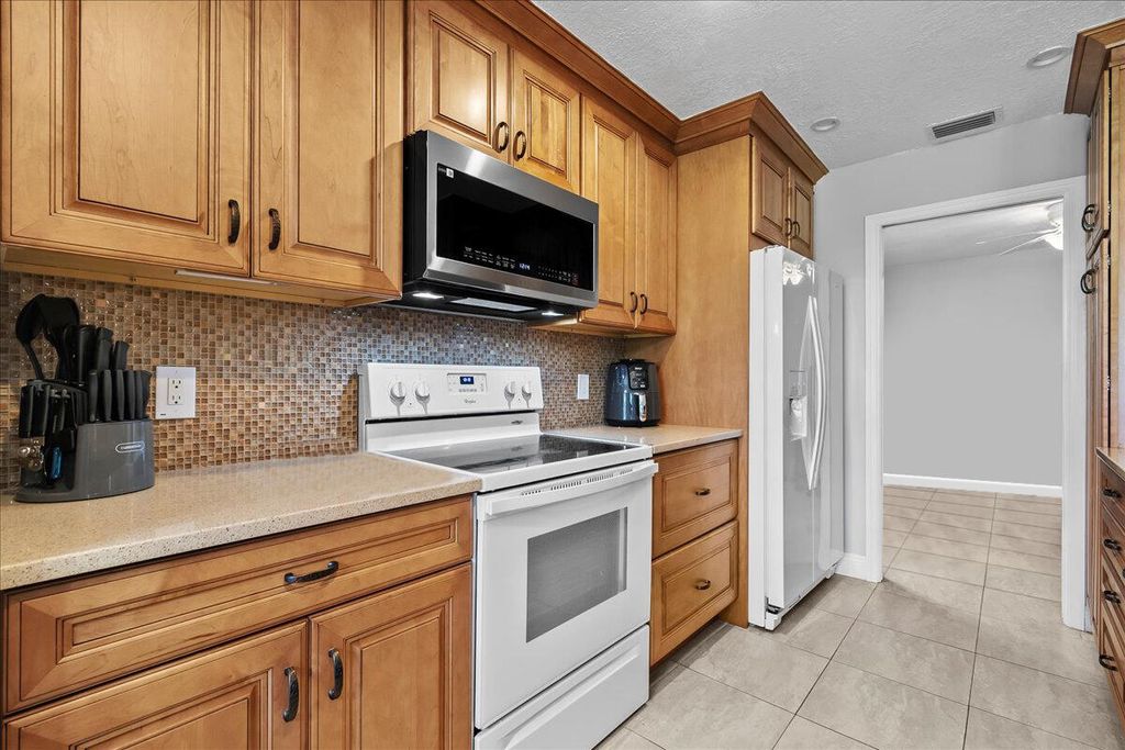 Photo of 400 Crosswinds Drive #B1, Greenacres, FL 33413 (MLS # R11139228)