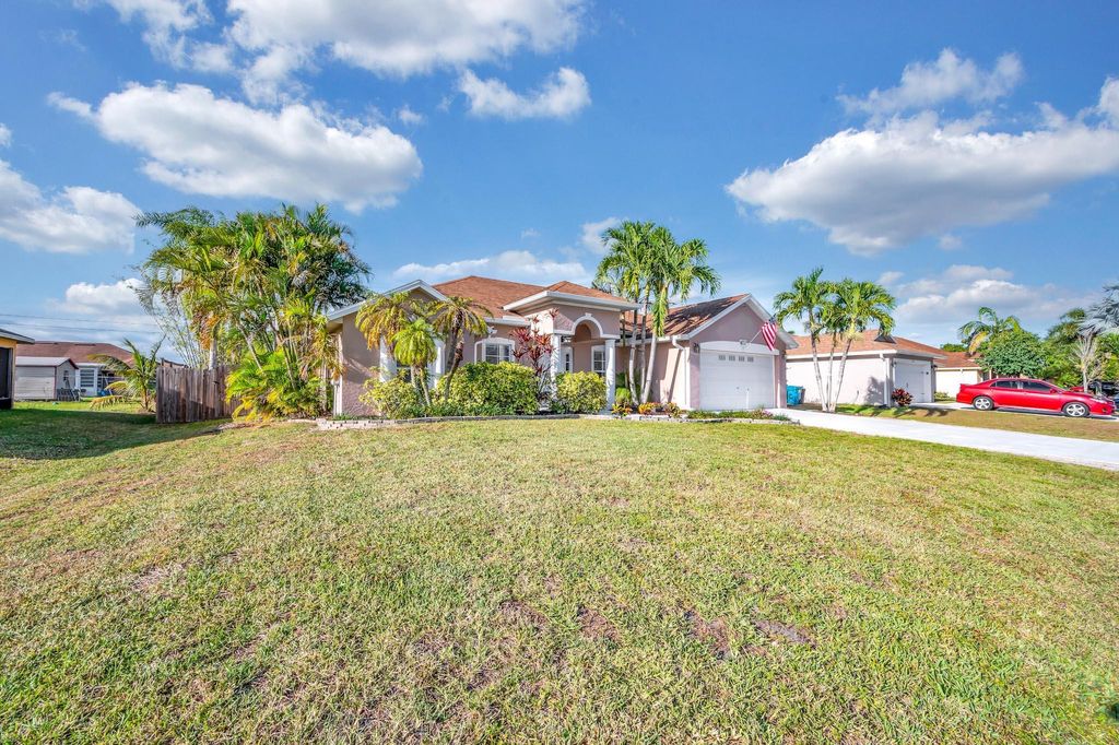 Photo of 671 SW Hoffenberg Avenue, Port Saint Lucie, FL 34953 (MLS # R10975376)