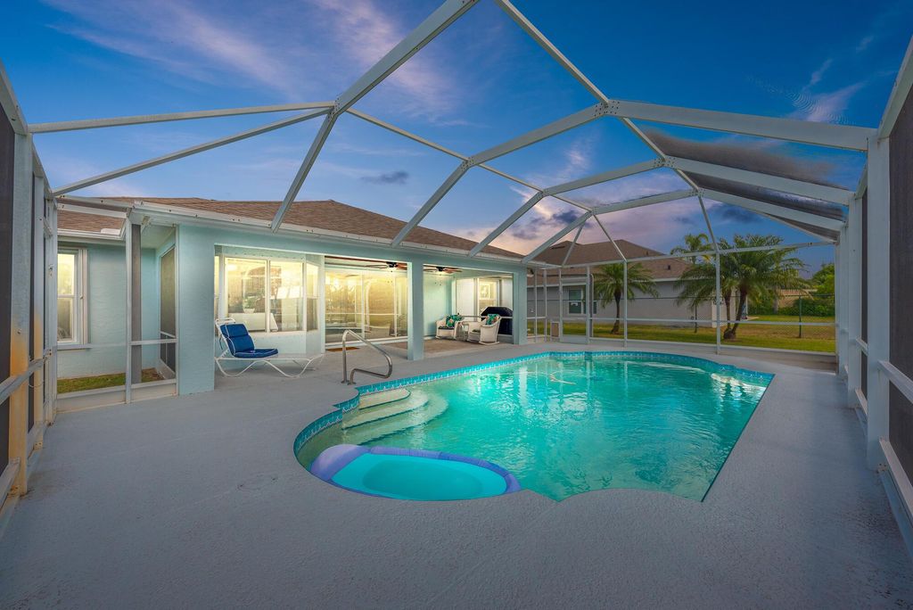 Photo of 1937 SE Mantua Street, Port Saint Lucie, FL 34952 (MLS # R10981044)