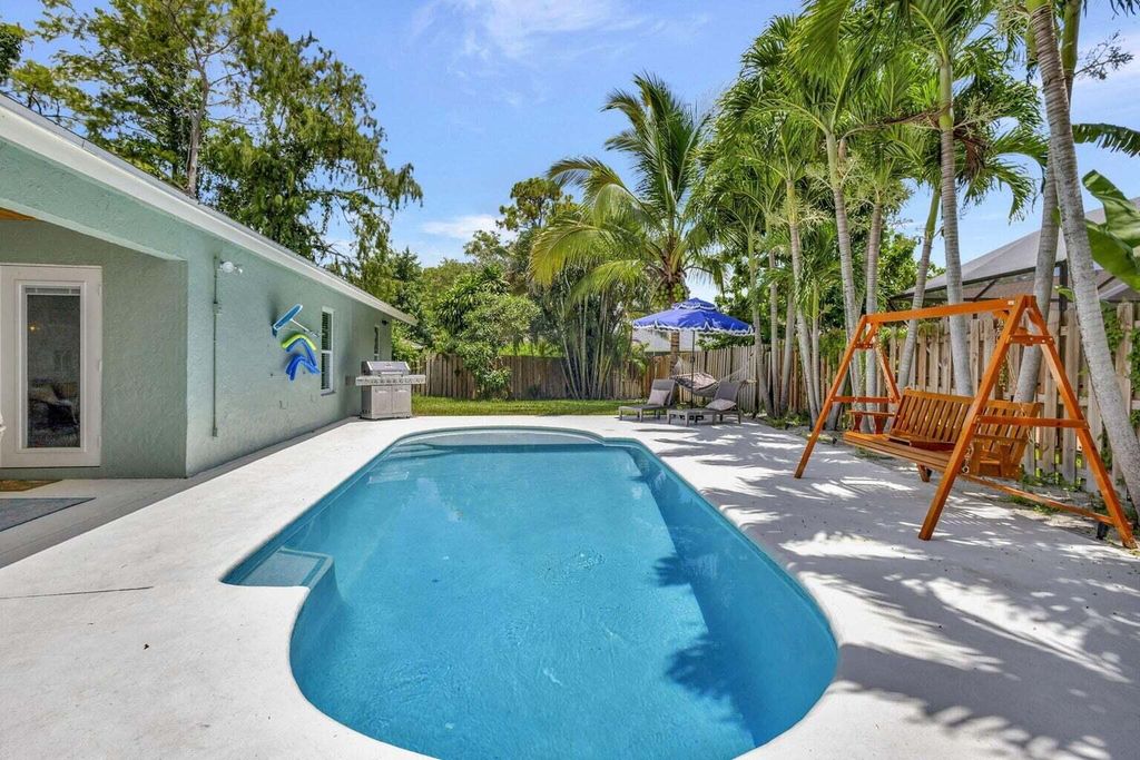 Photo of 1560 Firethorn Drive, Wellington, FL 33414 (MLS # R11072067)