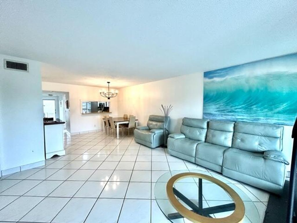 Photo of 3601 Inverrary Drive #306, Lauderhill, FL 33319 (MLS # B26025011)
