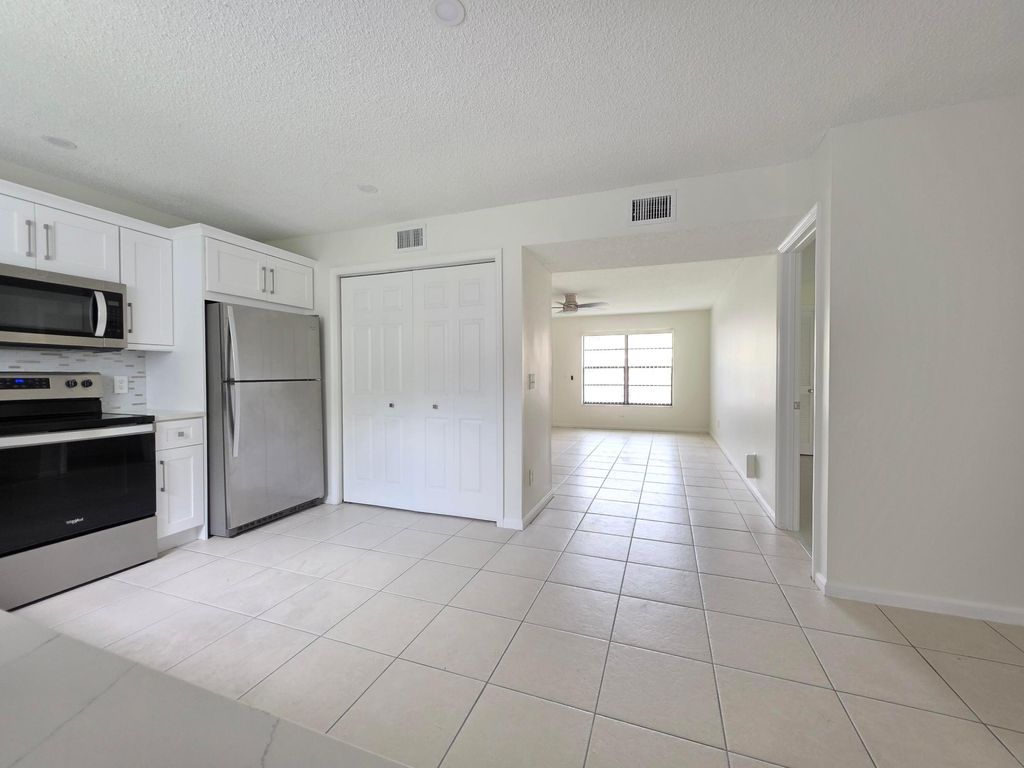 Photo of 5954 Longbow Lane, West Palm Beach, FL 33415 (MLS # B26014378)