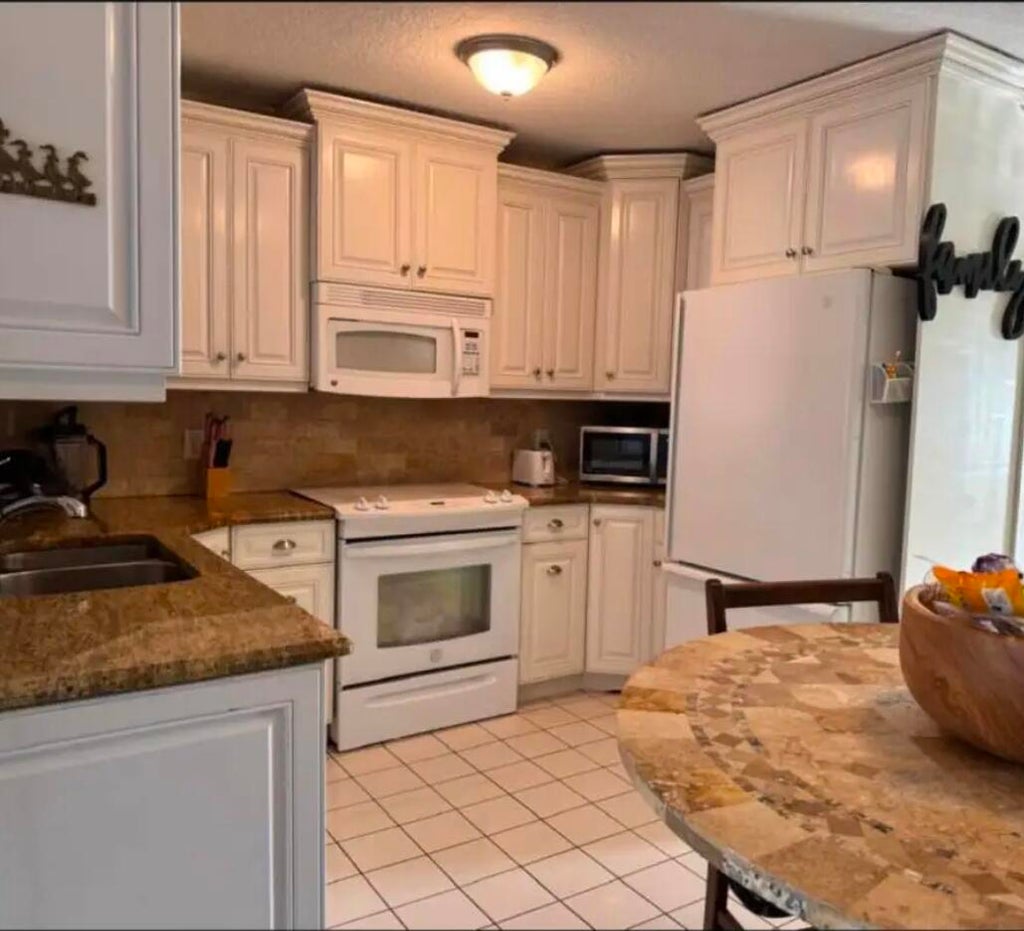 Photo of 1813 SE Balleto Street, Port Saint Lucie, FL 34952 (MLS # B26044861)