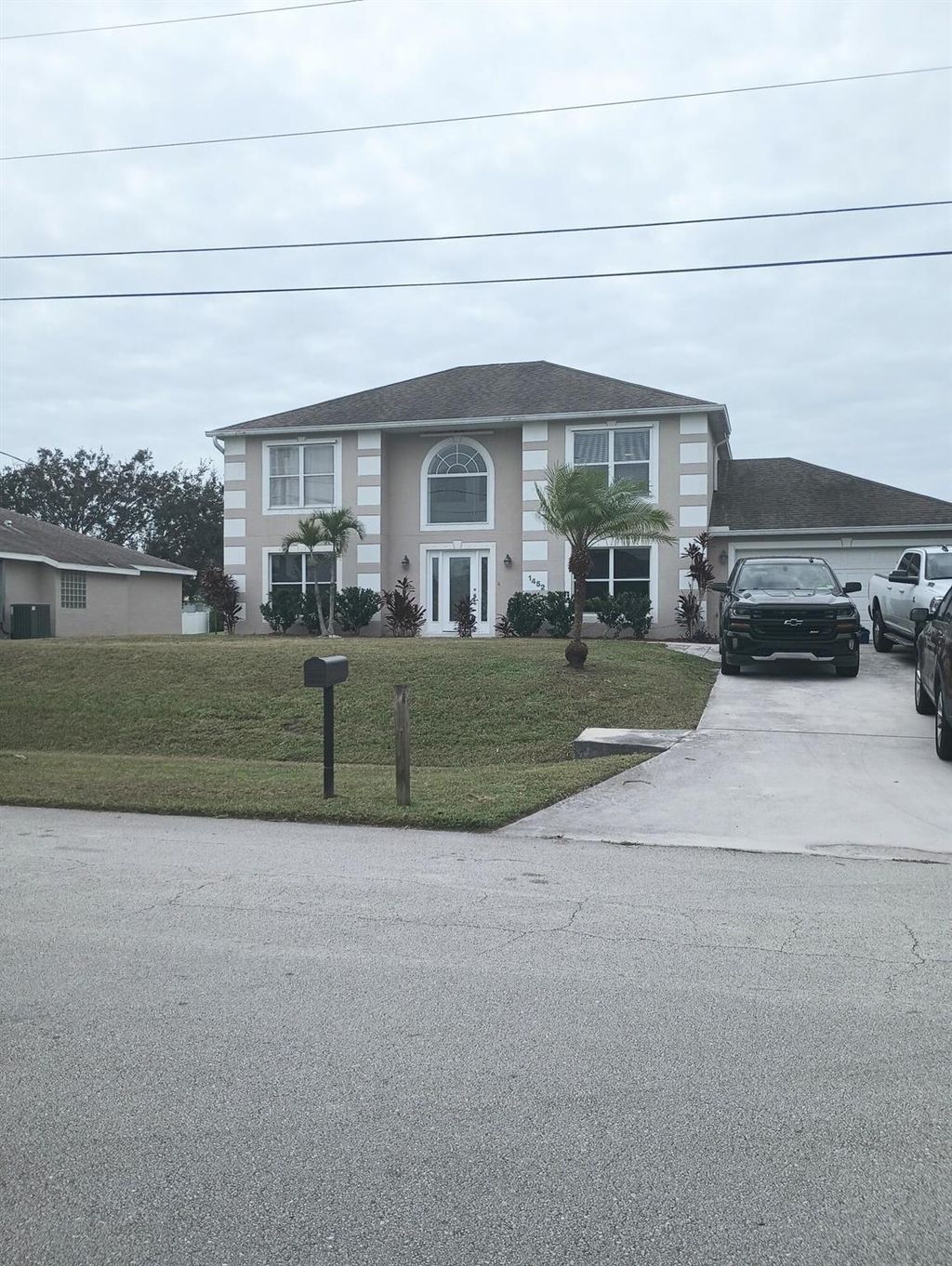 Photo of 1452 SW Falmouth Avenue, Port Saint Lucie, FL 34953 (MLS # R10916516)