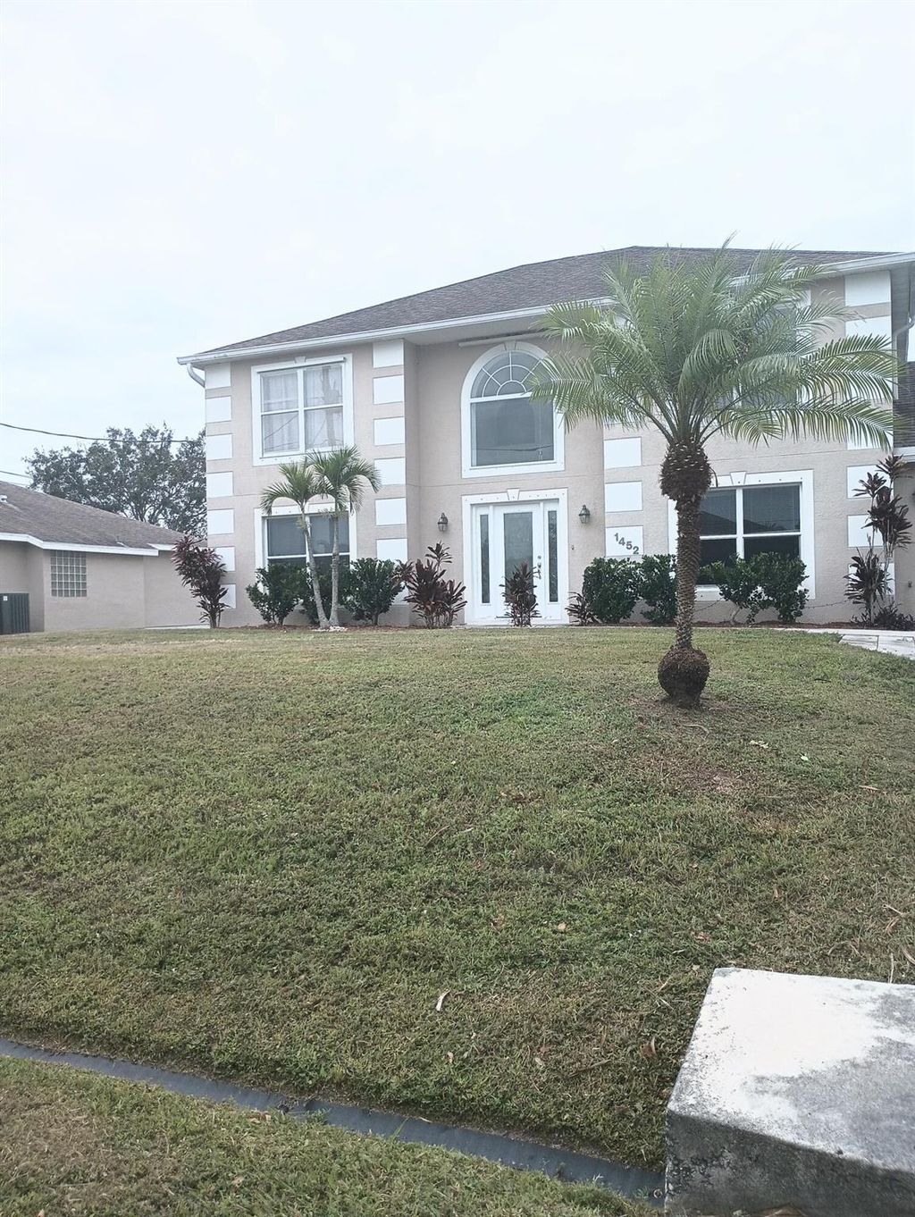 Photo of 1452 SW Falmouth Avenue, Port Saint Lucie, FL 34953 (MLS # R10916516)