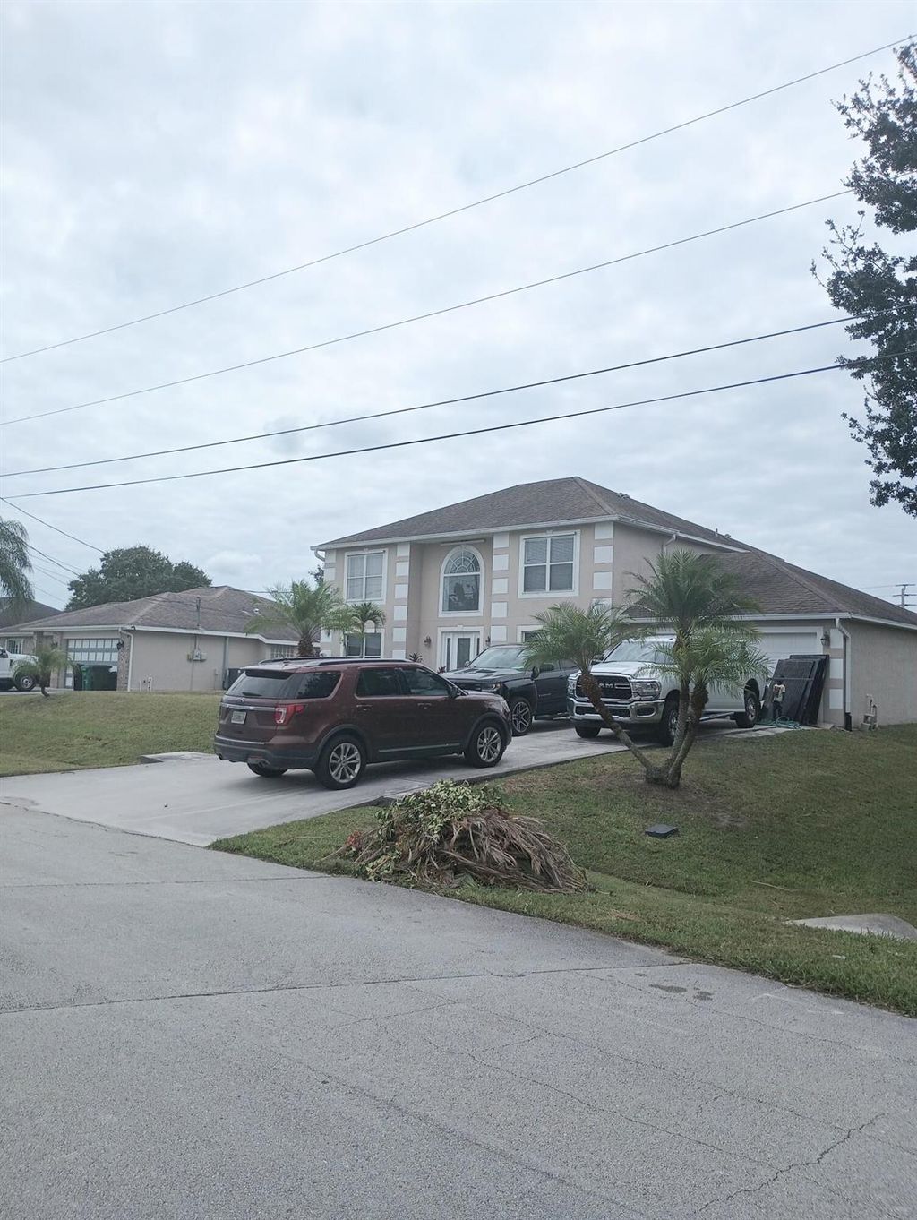 Photo of 1452 SW Falmouth Avenue, Port Saint Lucie, FL 34953 (MLS # R10916516)