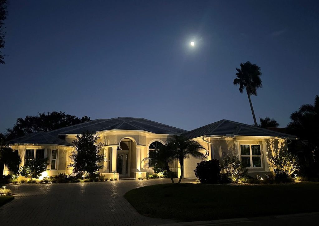 Photo of 1752 SW Foxpoint Trail, Palm City, FL 34990 (MLS # R10898334)