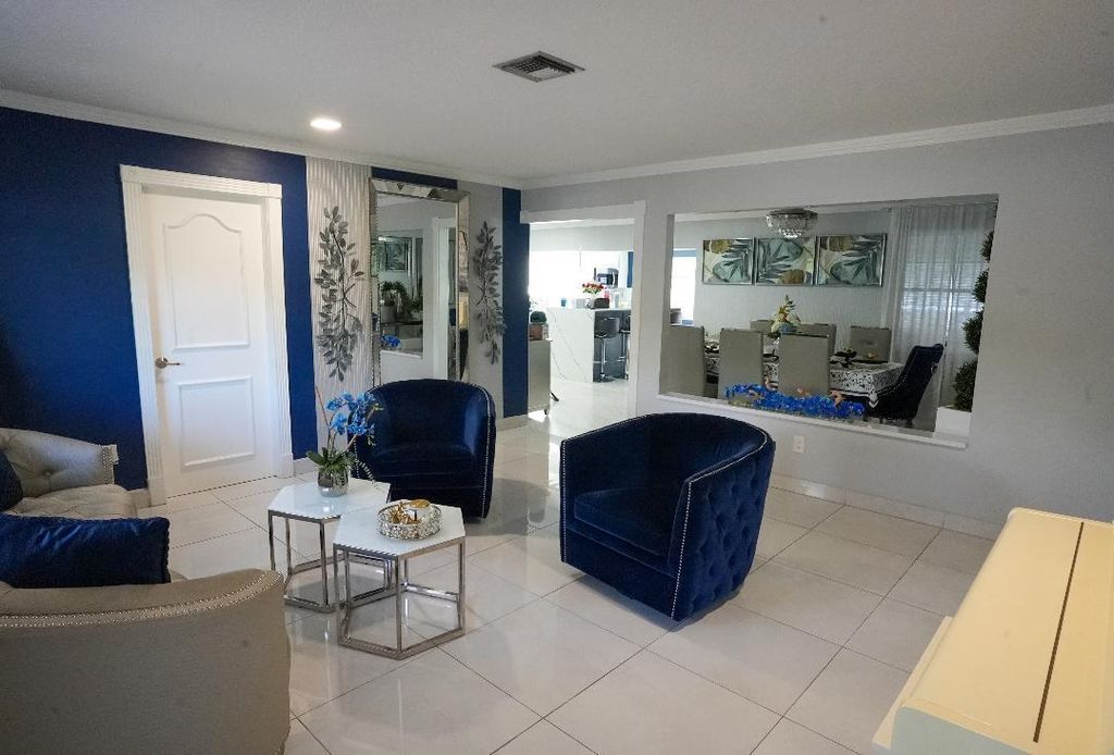 Photo of 448 Alemeda Drive, Palm Springs, FL 33461 (MLS # R11168353)