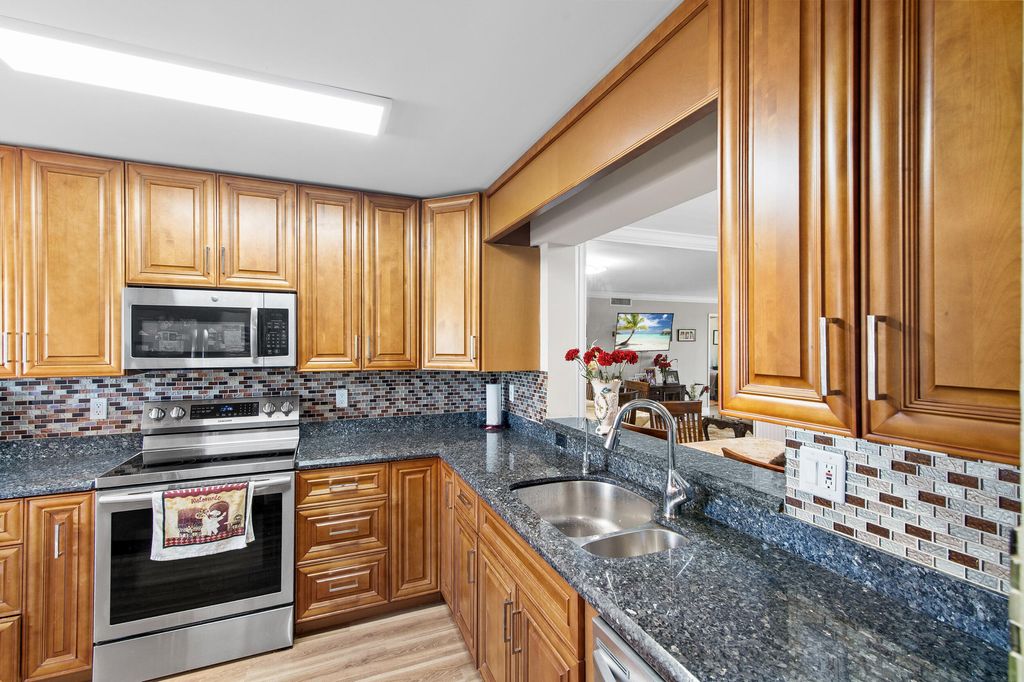 Photo of 15355 Lakes Of Delray Boulevard #309, Delray Beach, FL 33484 (MLS # B26013026)