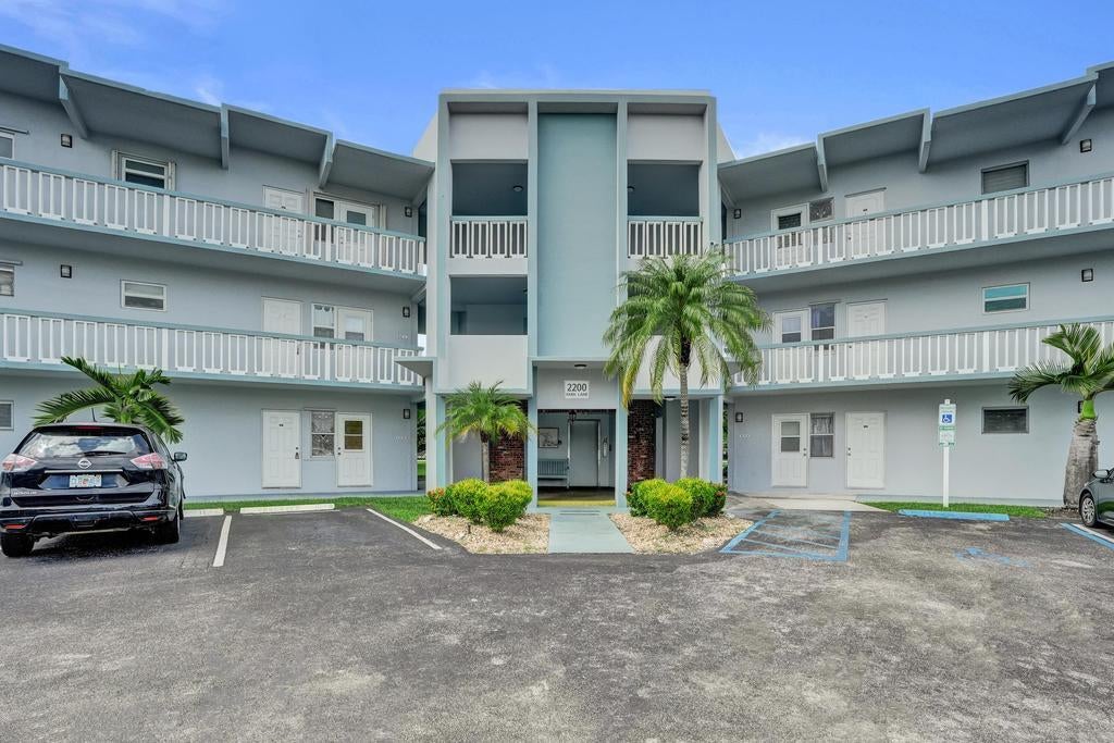 Photo of 2200 Park Lane #Unit 111, Hollywood, FL 33021 (MLS # B26080202)