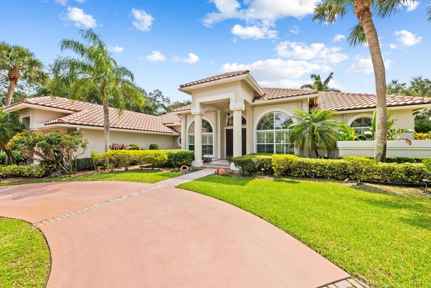 7200 Cutter Court stands as a distinguished property featuring a thoughtfully designed split floor plan and over 5,500 square feet of total living space. This residence offers four bedrooms, plus a dedicated office that can easily serve as a fifth bedroom, Crown molding, plantation shutters and painted inside and out.   The home has undergone comprehensive renovations, seamlessly blending modern aesthetics with practical functionality. The kitchen—truly a focal point for culinary enthusiasts—showcases striking custom white wood cabinetry, premium Wolf appliances, and an elegant wet bar complete with a wine cooler and beverage center. Designed with intention, this space effortlessly supports both everyday living and sophisticated entertaining.  The primary suite offers a private sitting area along with two custom-finished walk-in closets, delivering both luxury and convenience. The fully renovated primary bathroom features a smart toilet and separate his-and-her dressing areas, creating a serene retreat that embodies comfort and elegance. Throughout the main living areas, beautiful porcelain tile flooring complements soaring ceilings, enhancing the home's sense of openness and light. The newly renovated laundry room includes generous storage cabinetry and a utility sink for added efficiency. Built-in hallway cabinets with marble countertops provide additional storage while adding a refined design element. An oversized 3.5+ car, side-entry garage further enhances the home's functionality. Safety and security are paramount, with hurricane-impact front and garage doors, along with accordion shutters installed on all windows and doors. Perfectly situated on a builder's acre within a quiet double cul-de-sac, the property offers minimal traffic and a tranquil setting. Located in Cypresshead, a prestigious 24-hour guard-gated community, residents enjoy an array of amenities including a clubhouse, fitness center, community pool, pickle ball, tennis courts, playgrounds, and a boating and fishing pier. The home is also conveniently located within walking distance of A-rated schools, as well as nearby restaurants, shopping, and places of worship—further enhancing its appeal. 7200 Cutter Court presents a rare opportunity to experience a seamless blend of luxury, comfort, and accessibility in one of the area's most desirable communities.
