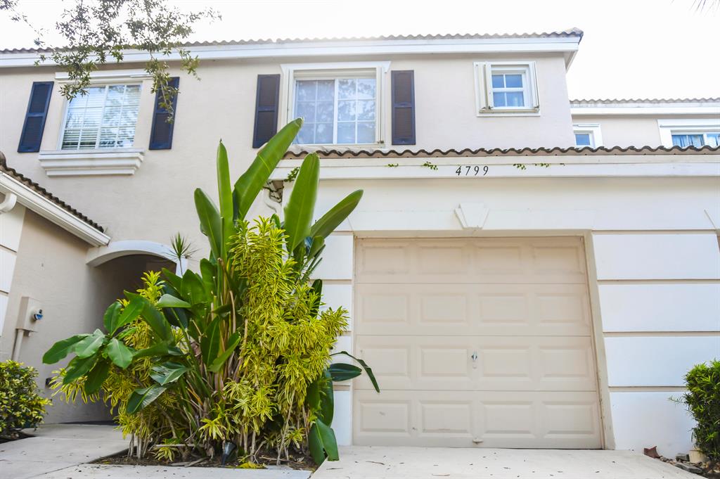 Spacious, well maintained 2/2.5, 1 car garage Townhome with Garden Views. Located in the gated community of Jonathan's Cove. Screen enclosed patio off living room. Featuring hard wood floors upstairs, upgraded master bathroom and newer A/C (2018) Both bedrooms located on the second floor with loft area, easily converted into a 3rd bedroom, office, play room or just extra space. This townhome is centrally located near the airport, Minor League Baseball Stadium Complex, Downtown, and I95.