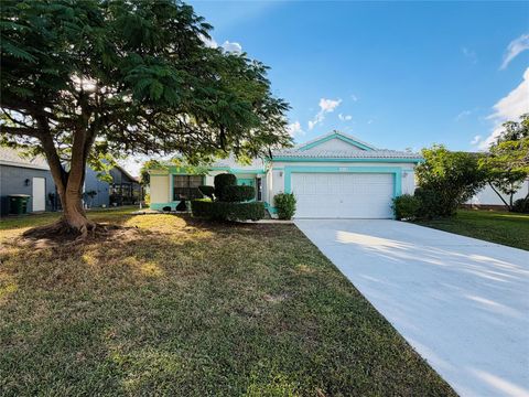 Photo of 7013 NW 107th Ave, Tamarac, FL 33321 (MLS # F10538696)