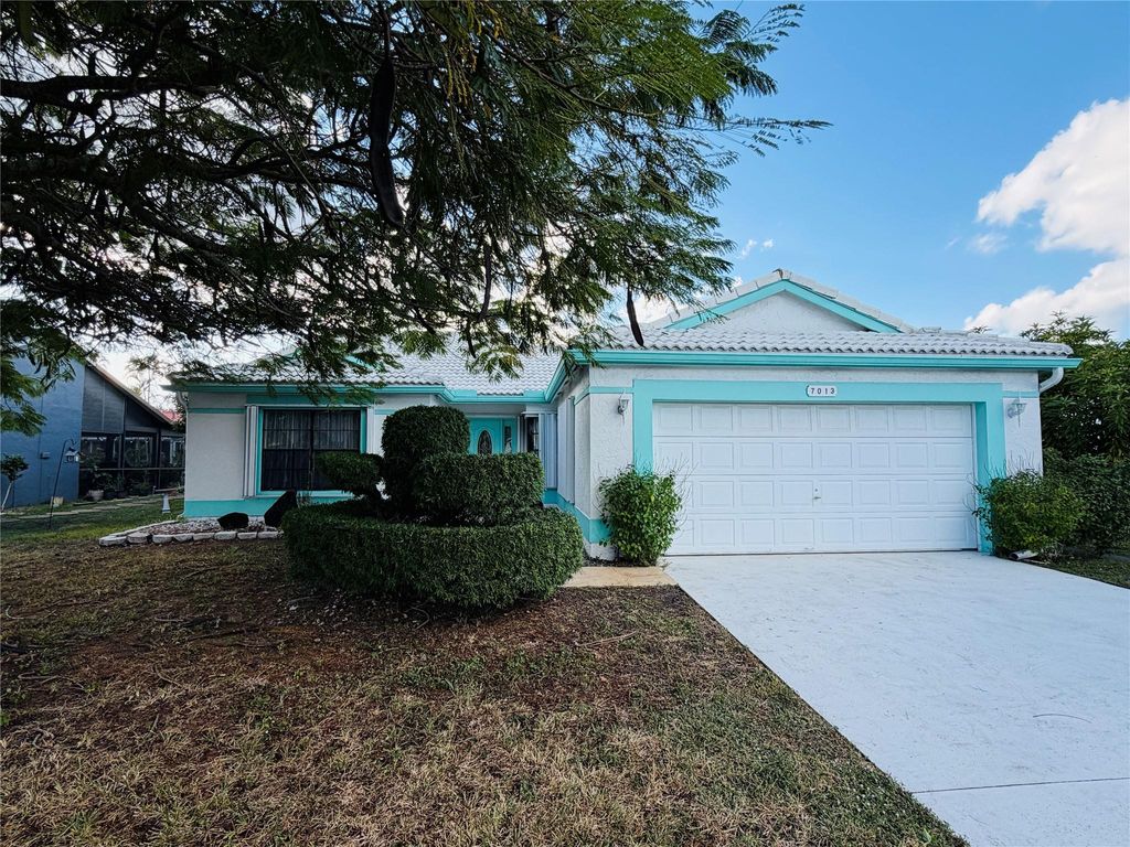 Photo of 7013 NW 107th Ave, Tamarac, FL 33321 (MLS # F10538696)