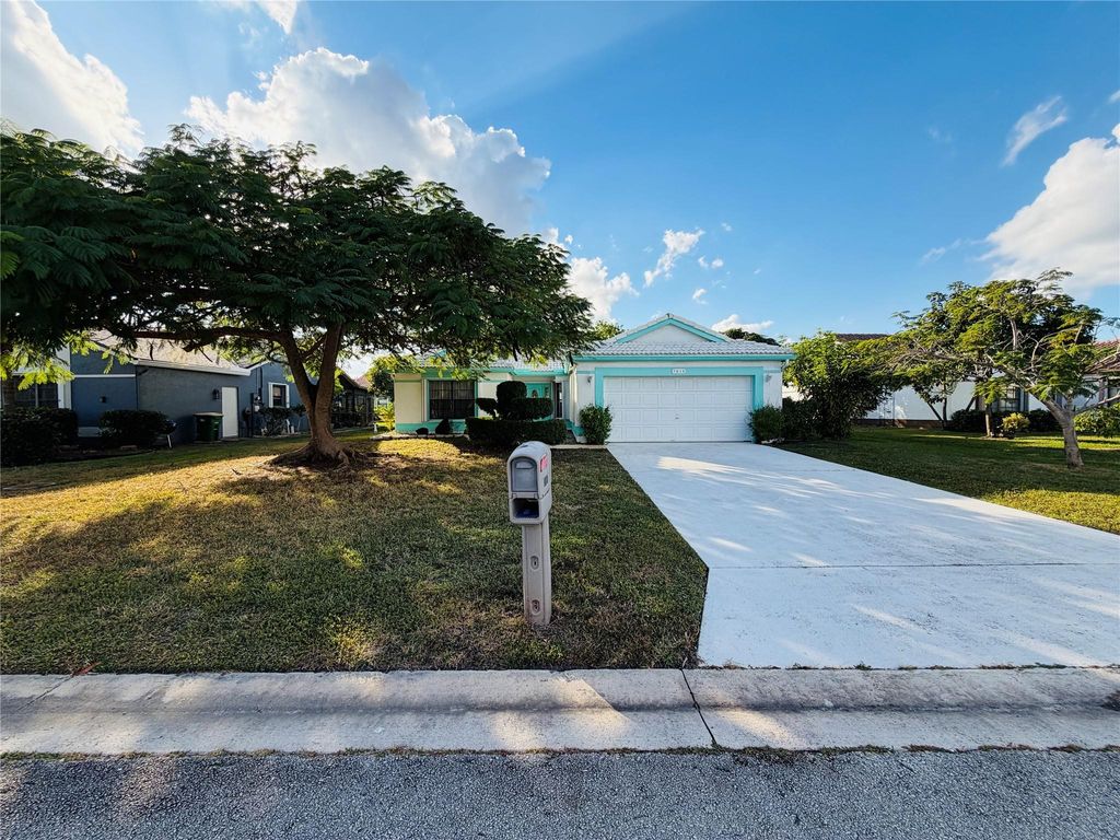 Photo of 7013 NW 107th Ave, Tamarac, FL 33321 (MLS # F10538696)