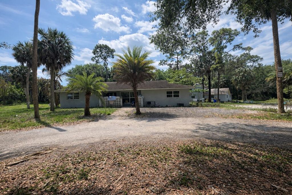 Photo of 481 S 56th Ter Terrace S, West Palm Beach, FL 33415 (MLS # B26007043)