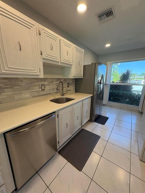 Photo of 13782 Via Flora #C, Delray Beach, FL 33484 (MLS # R11137031)