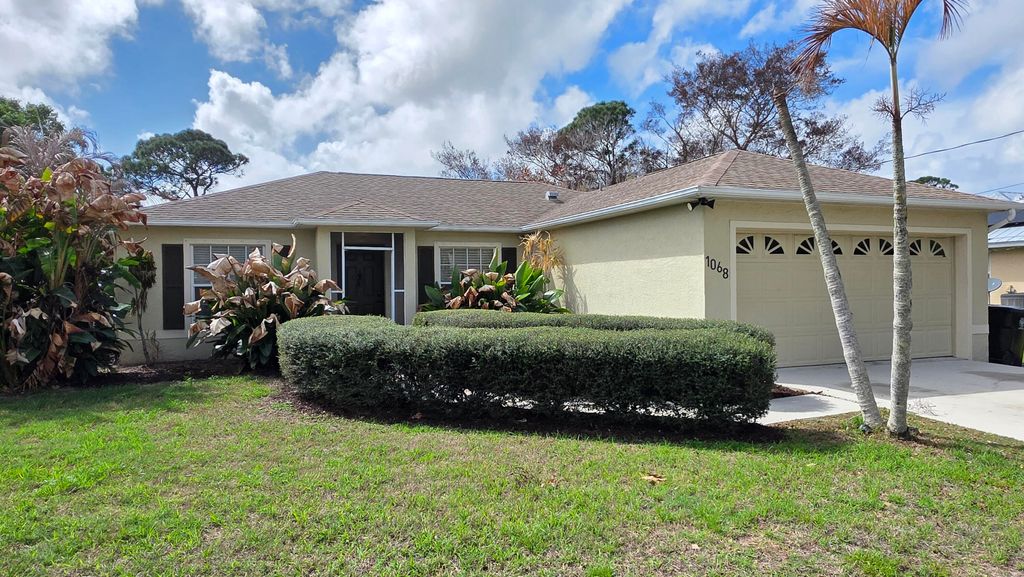 Photo of 1068 SE Prineville Street, Port Saint Lucie, FL 34983 (MLS # R11169716)
