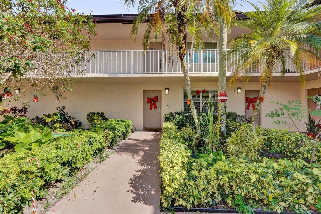 Photo of 8740 Azalea Ct #102, Tamarac, FL 33321 (MLS # F10541967)