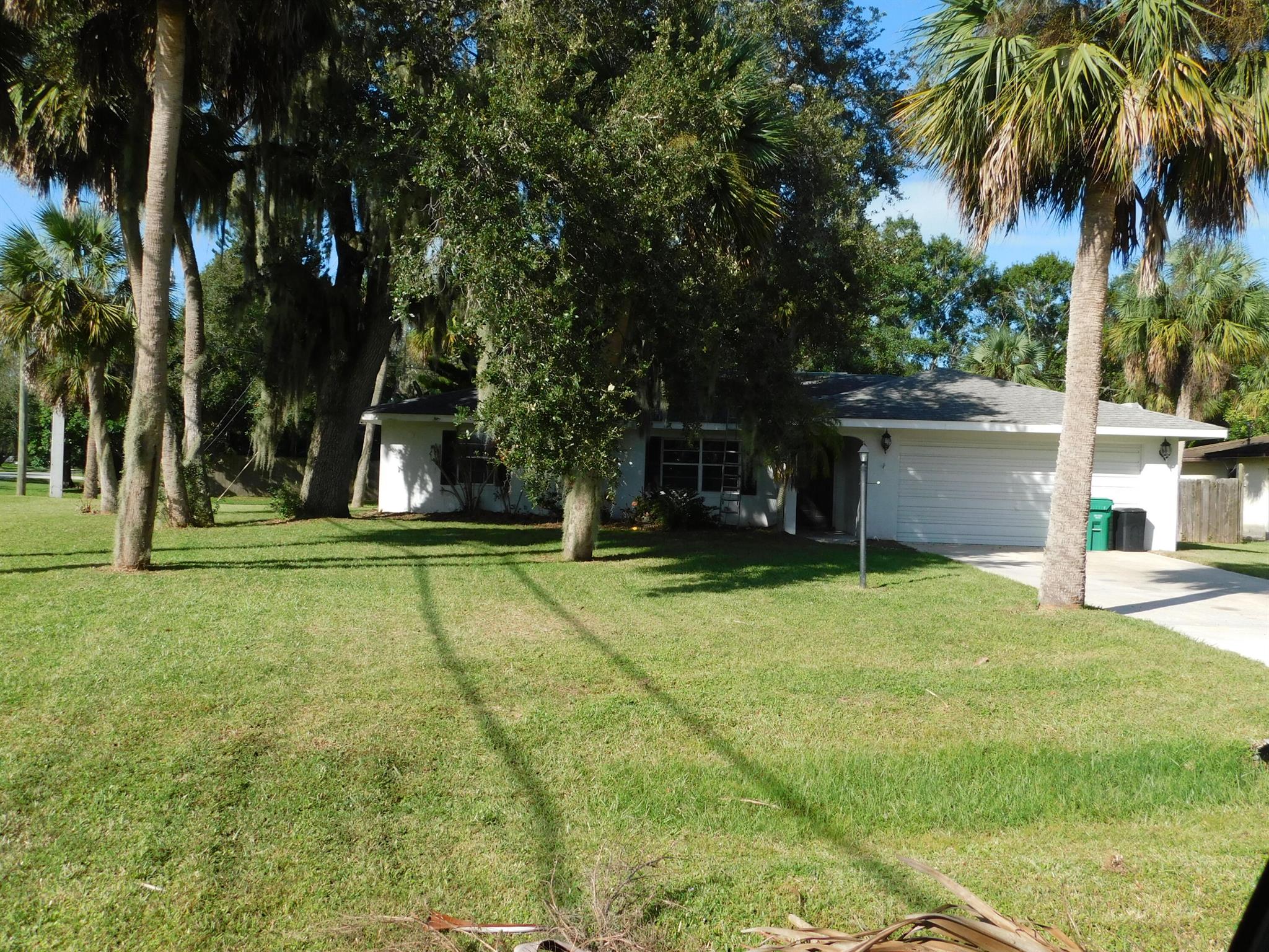 Three bedroom, two bath, two car garage home with county water and sewer. Split bedroom flooor plan with tile throughout.