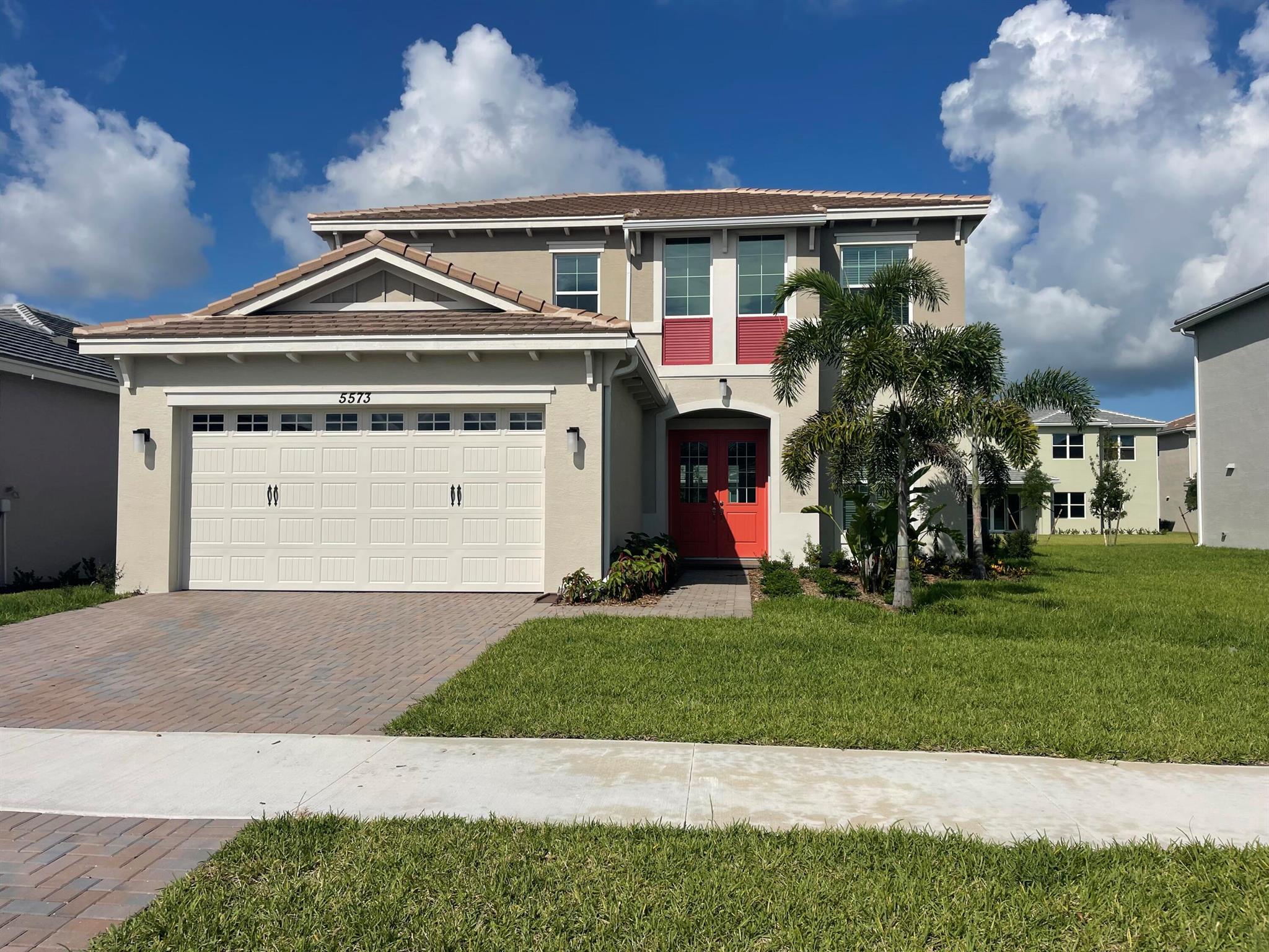 This brand new home has a classic and elegant design, upon entering the house, you are greeted with a large and open living area. The living room features large windows that let in plenty of natural light. There's also a dining area, and a large kitchen with stainless steel appliances, a center island, and plenty of counter space. Upstairs, there's a grand master suite with a spacious bedroom, a walk-in closet, and a luxurious master bathroom with a double vanity, a soaking tub, and a separate shower. There are also two additional bedrooms with a shared bathroom and a laundry room. Overall, this two-story home with a double master is perfect for a family looking for a spacious, high-end, and stylish living space.