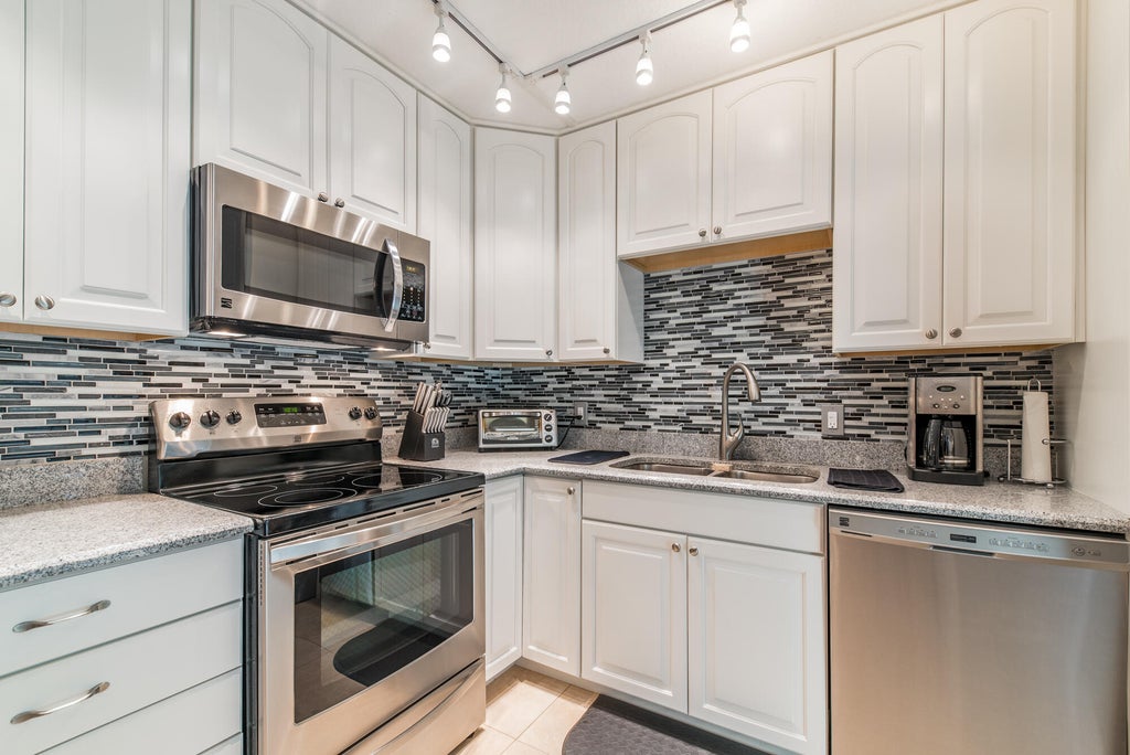 Photo of 717 7TH Lane, Palm Beach Gardens, FL 33418 (MLS # B26079423)