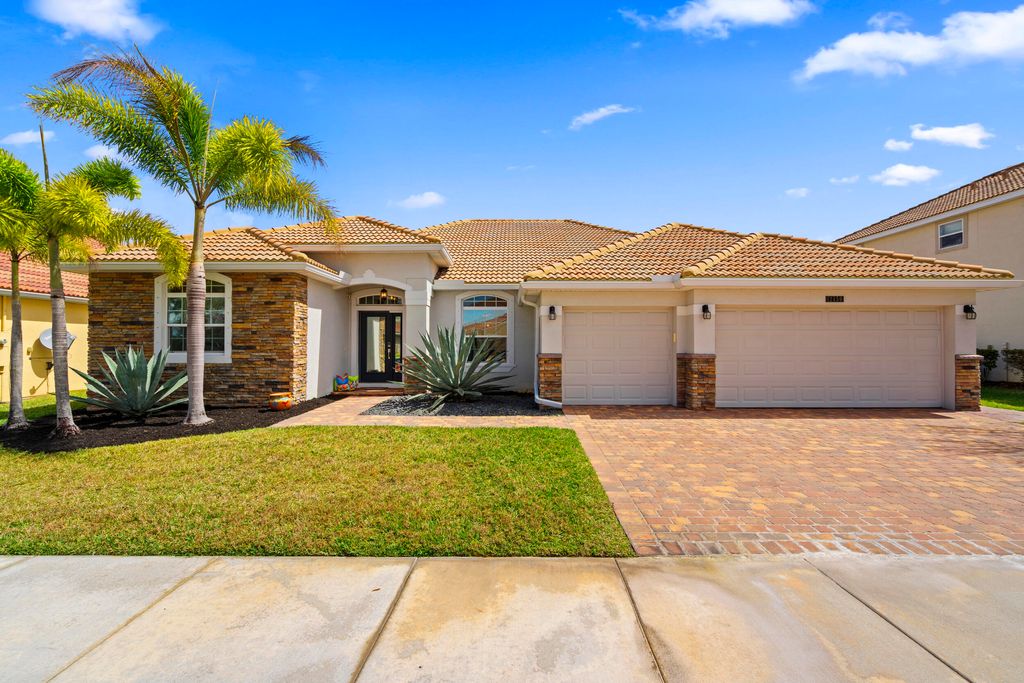 Photo of 12150 SW Aventino Drive, Port Saint Lucie, FL 34987 (MLS # B26001964)
