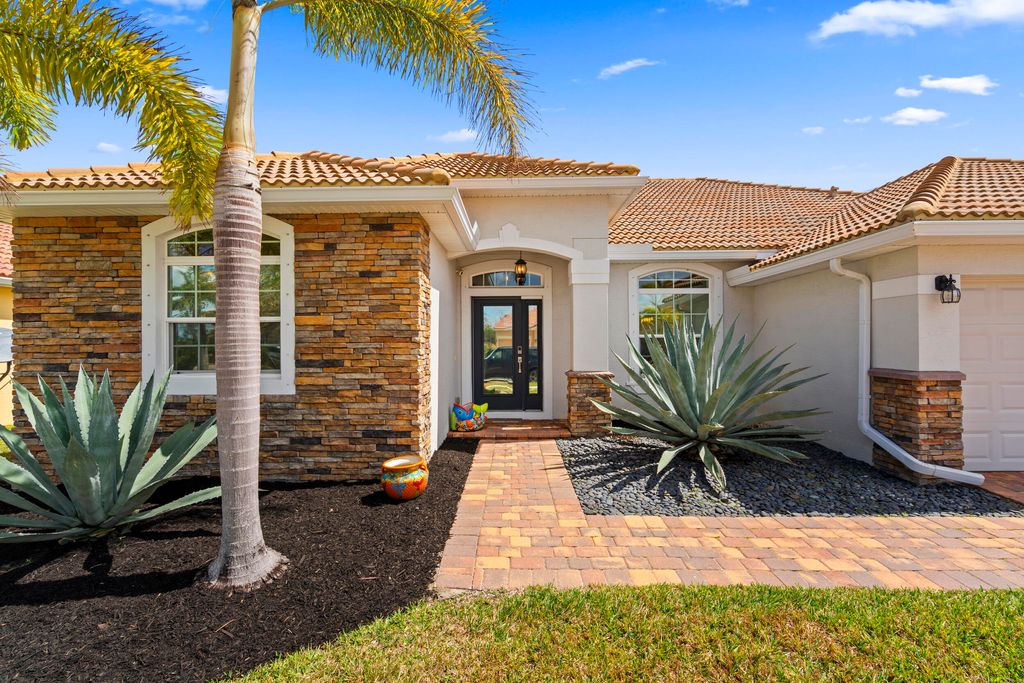 Photo of 12150 SW Aventino Drive, Port Saint Lucie, FL 34987 (MLS # B26001964)