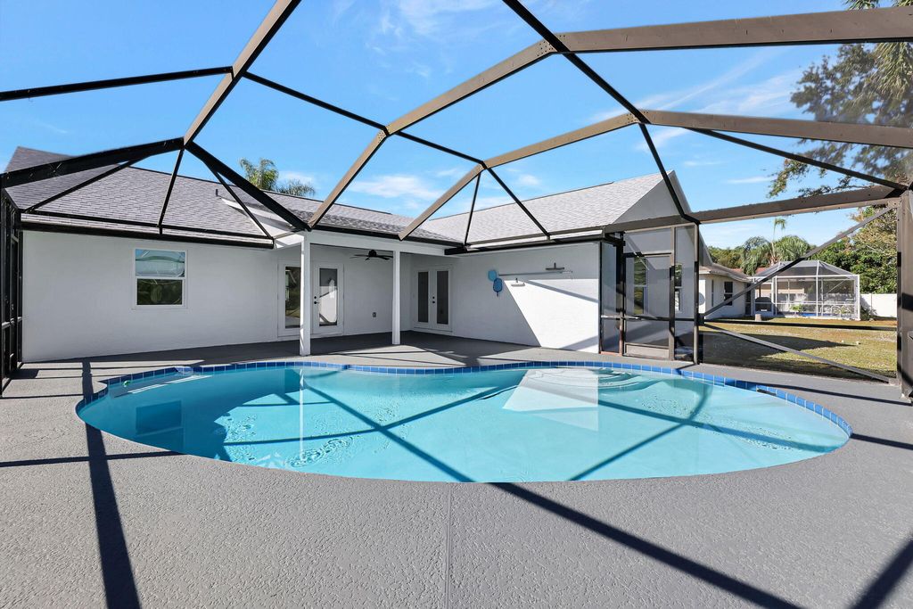 Photo of 3240 SE West Snow Road, Port Saint Lucie, FL 34984 (MLS # R11040873)