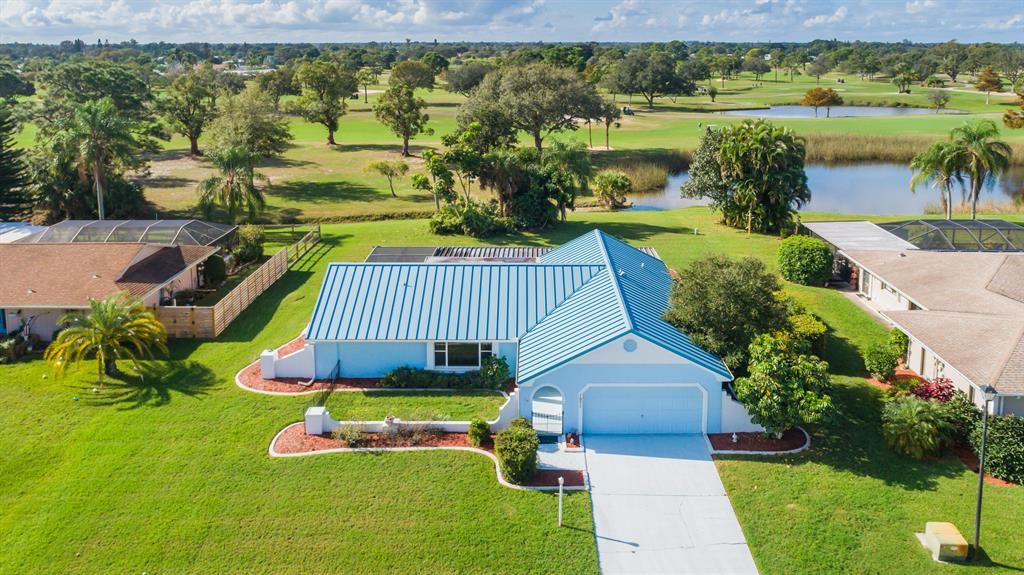 Photo of 1971 SE Erwin Road, Port Saint Lucie, FL 34952 (MLS # R10765082)